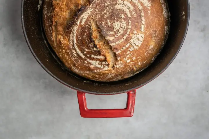 Freshly baked bread in the red dutch oven